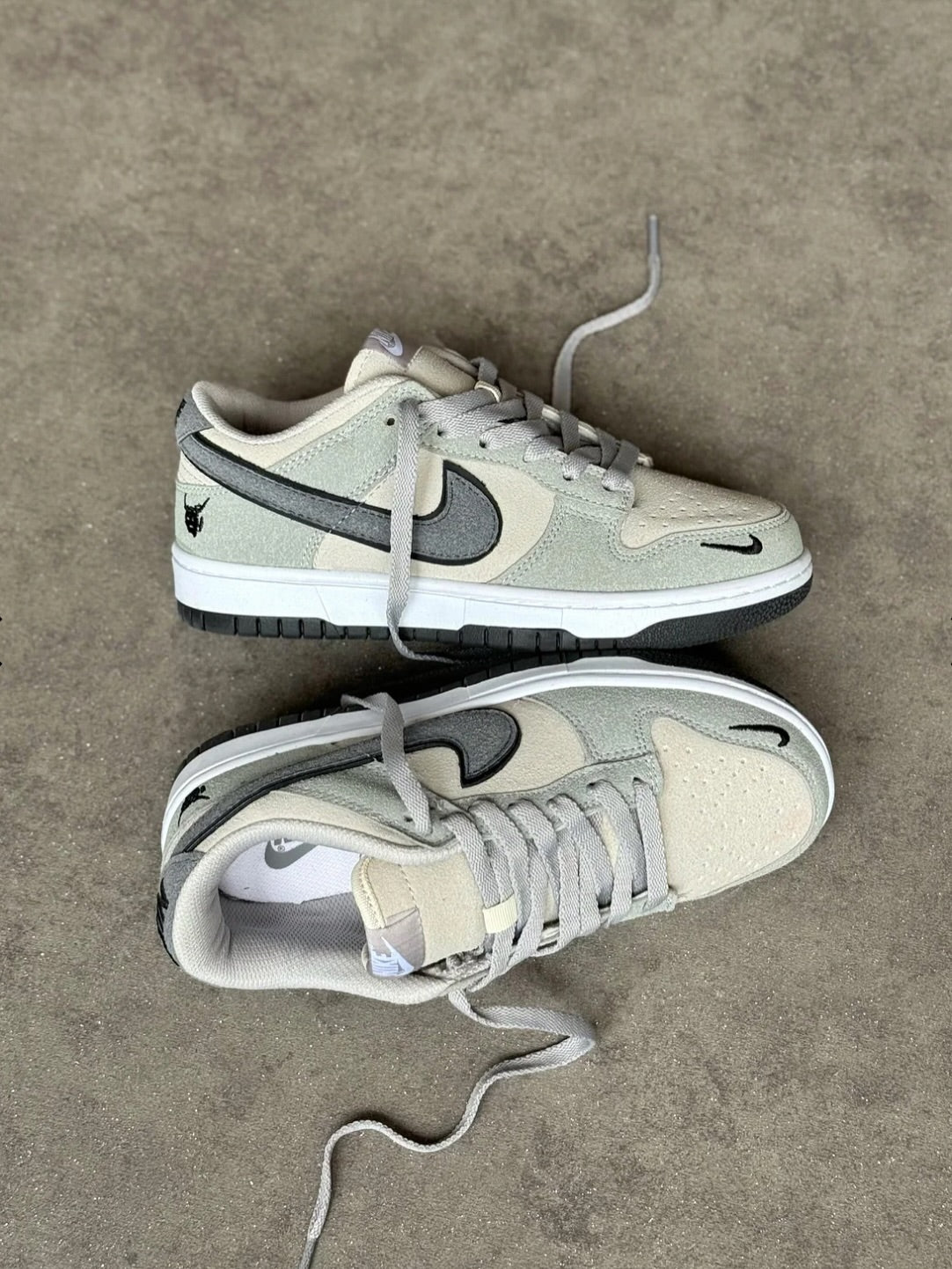 The Nike Dunk Low in light grey