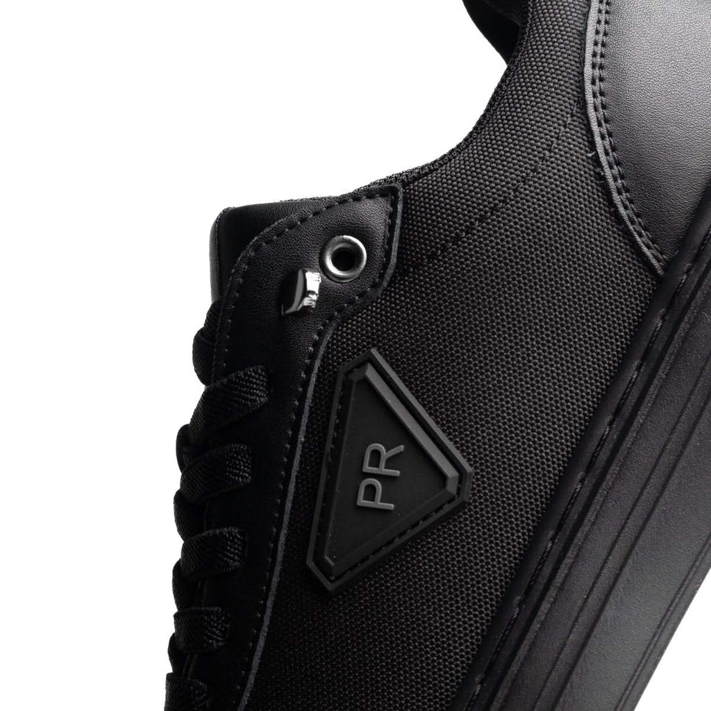 Delta Noire — Baskets hybrides en cuir et denim technique