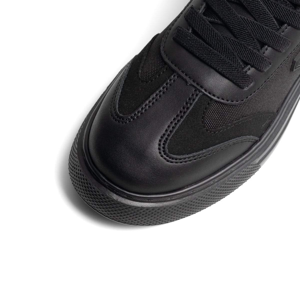 Delta Noire — Baskets hybrides en cuir et denim technique